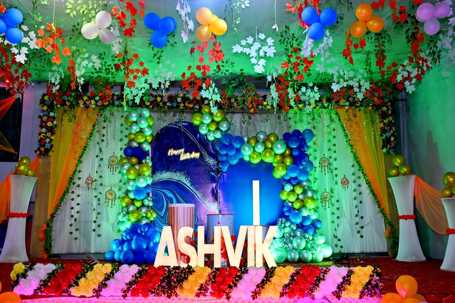 Colorful Birthday Celebration Stage Decoration with Balloons and Flowers