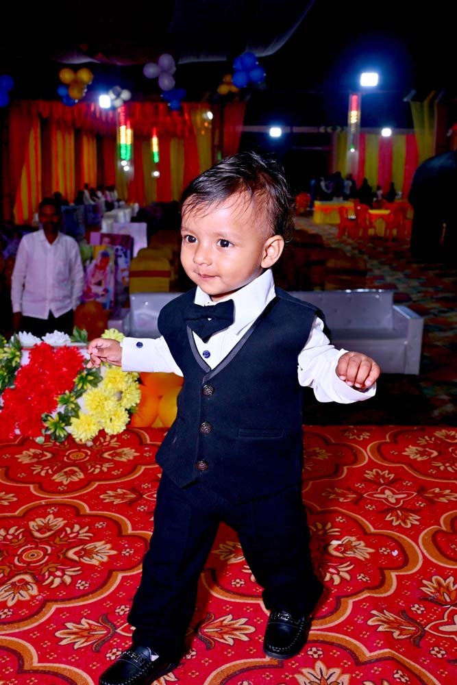 Cute Child in Formal Outfit at Birthday Celebration
