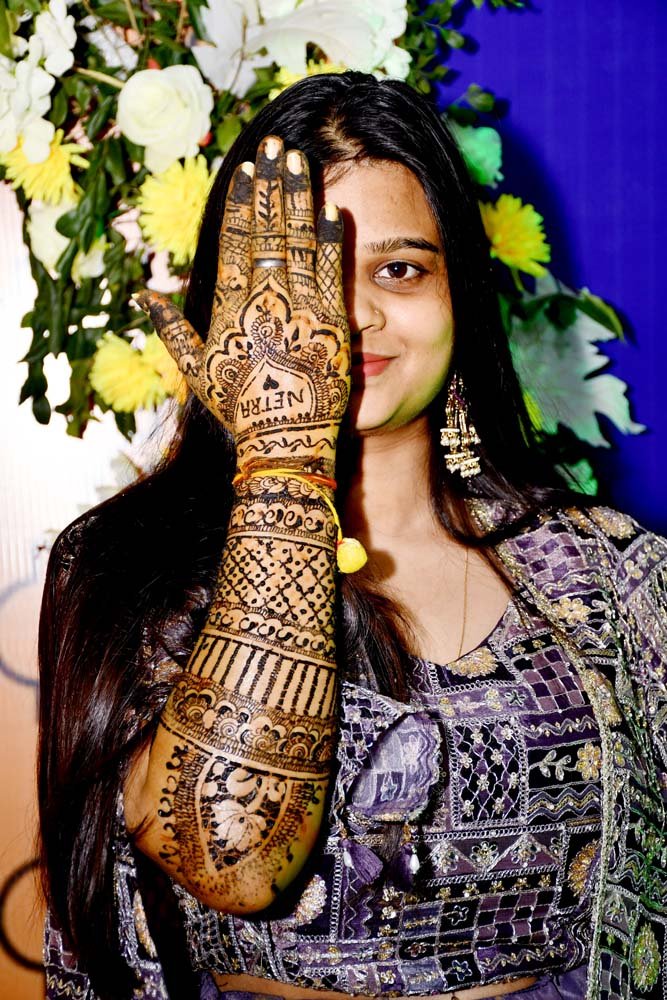 Beautiful Woman Showing Intricate Mehendi Design